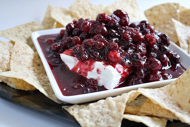 Cranberry Salsa Dip combines cream cheese, spices, and cream cheese to make a simple and sweet side dish for the upcoming holiday festivities!