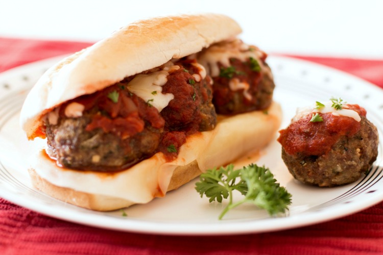 Meatball Sub recipe with flavorful, baked homemade meatballs, then assembled with 2 types of cheese, marinara sauce all on a crusty french roll. Perfect meatball sub recipe for dinner or lunch! 