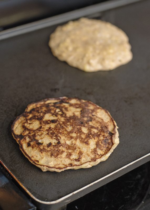 Banana Pancakes cooking on a griddle - Healthy, Quick, Simple, Delicious!