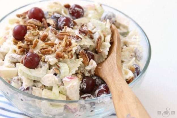 Chicken Pasta Salad is a lovely summer meal filled with tender chicken, apples, grapes, celery & pecans. Topped with a light dressing & chopped pecans.Â 