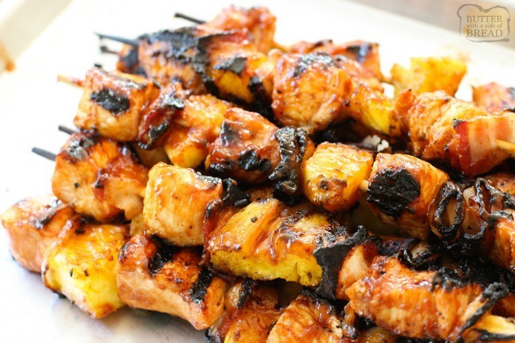BBQ Chicken Kabobs recipe with tender chicken grilled with pineapple and bacon then slathered with your favorite BBQ sauce. These ultimate BBQ recipe for grilled chicken kabobs are perfect for your next cookout!