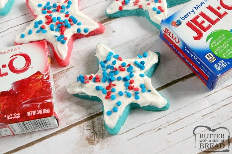 Patriotic Jello Sugar Cookies are easy to make with red and blue jello and a simple buttercream frosting that can be flavored to match! These sugar cookies can be rolled and cut out into shapes or just quickly scooped out into balls.