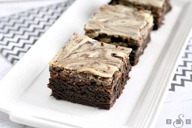 These Cookies & Cream Brownies are the perfect combination of cream cheese, brownies, and Oreo Cookies! Warning: you may want to eat the whole pan yourself!