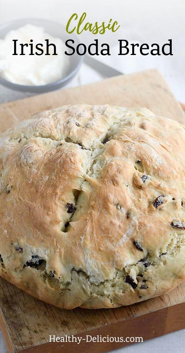 Classic Irish soda bread, made with white flour and studded with raisins, is surprisingly easy to make! Buttermilk adds a rich, tangy flavor and helps the bread rise and cooking it in a Dutch oven helps it keep its gorgeous round shape. You'll love this easy recipe! via @HealthyDelish
