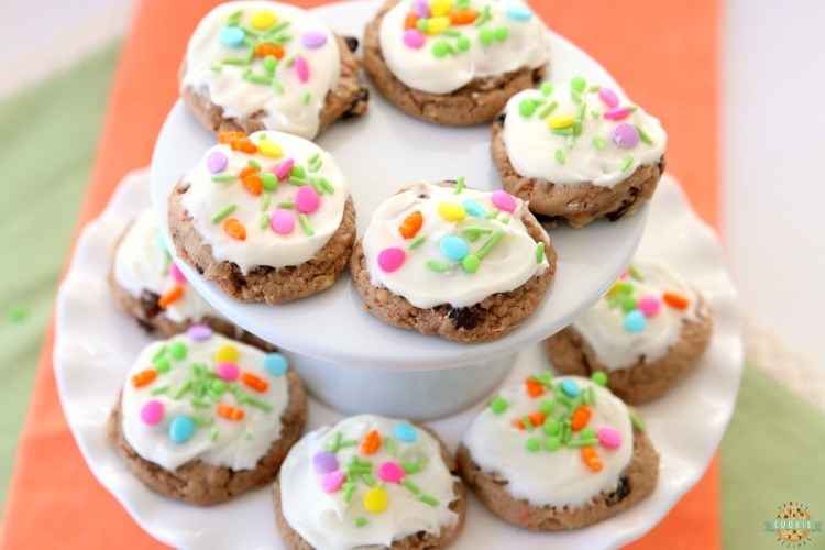 Carrot Cake Cookies are soft and chewy, flavorful carrot cake cookies made with a cake mix! Topped with a creamy cheesecake frosting, these carrot cake cookies are perfect for Easter! 