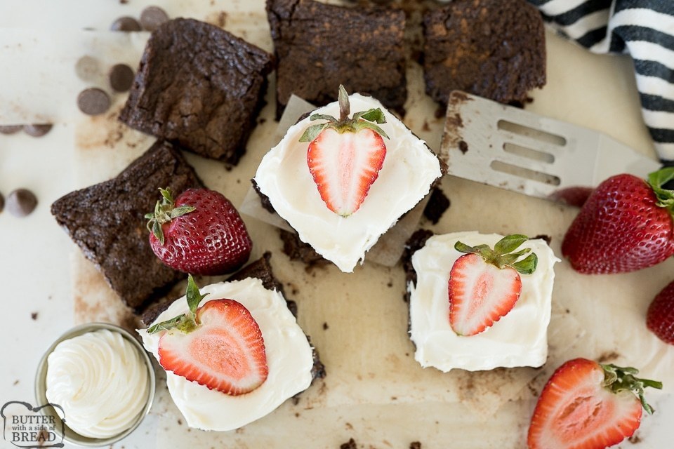 brownies with cream cheese frosting and strawberries