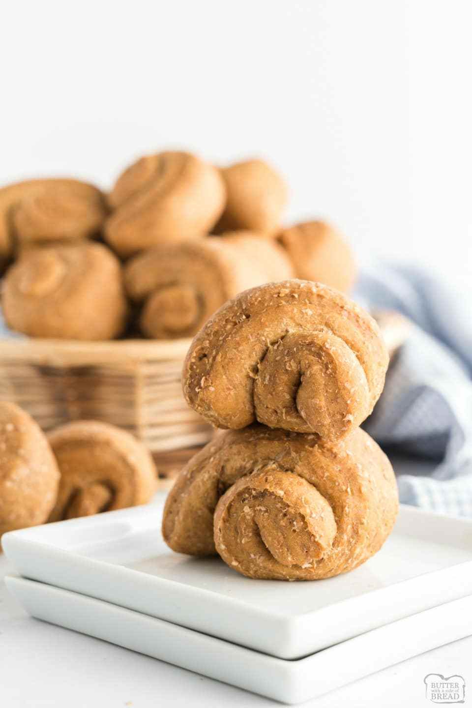 Soft Wheat Dinner Rolls made with whole wheat flour, yeast, oats and molasses for a homemade roll with fantastic taste and texture! Family favorite wheat dinner roll recipe!