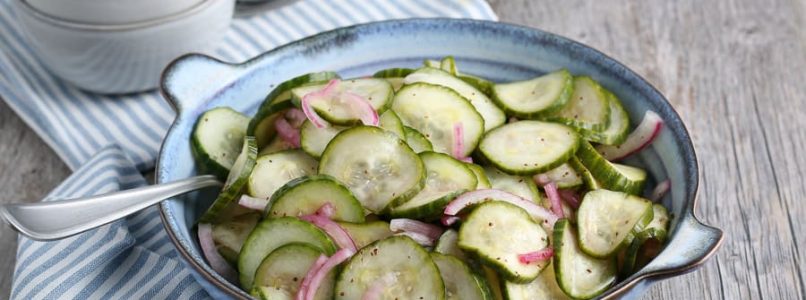 Quick and easy cucumber salad makes itself right at home next to just about any summer recipe. A sweet and tangy vinaigrette makes it so refreshing! via @HealthyDelish
