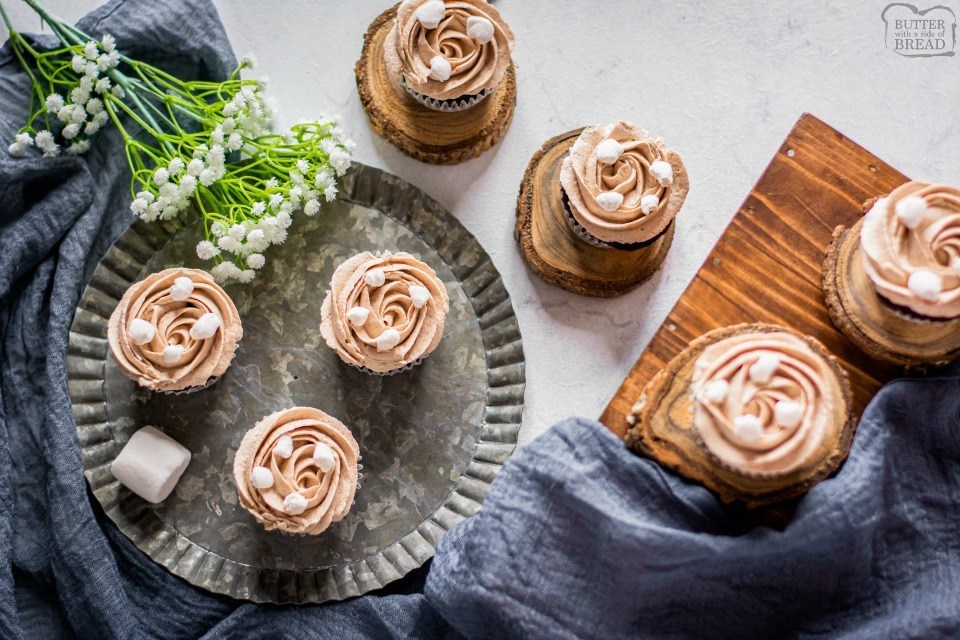 Hot chocolate cupcakes are soft chocolate cupcakes topped with hot chocolate buttercream for an indulgent & delicious chocolatey dessert.