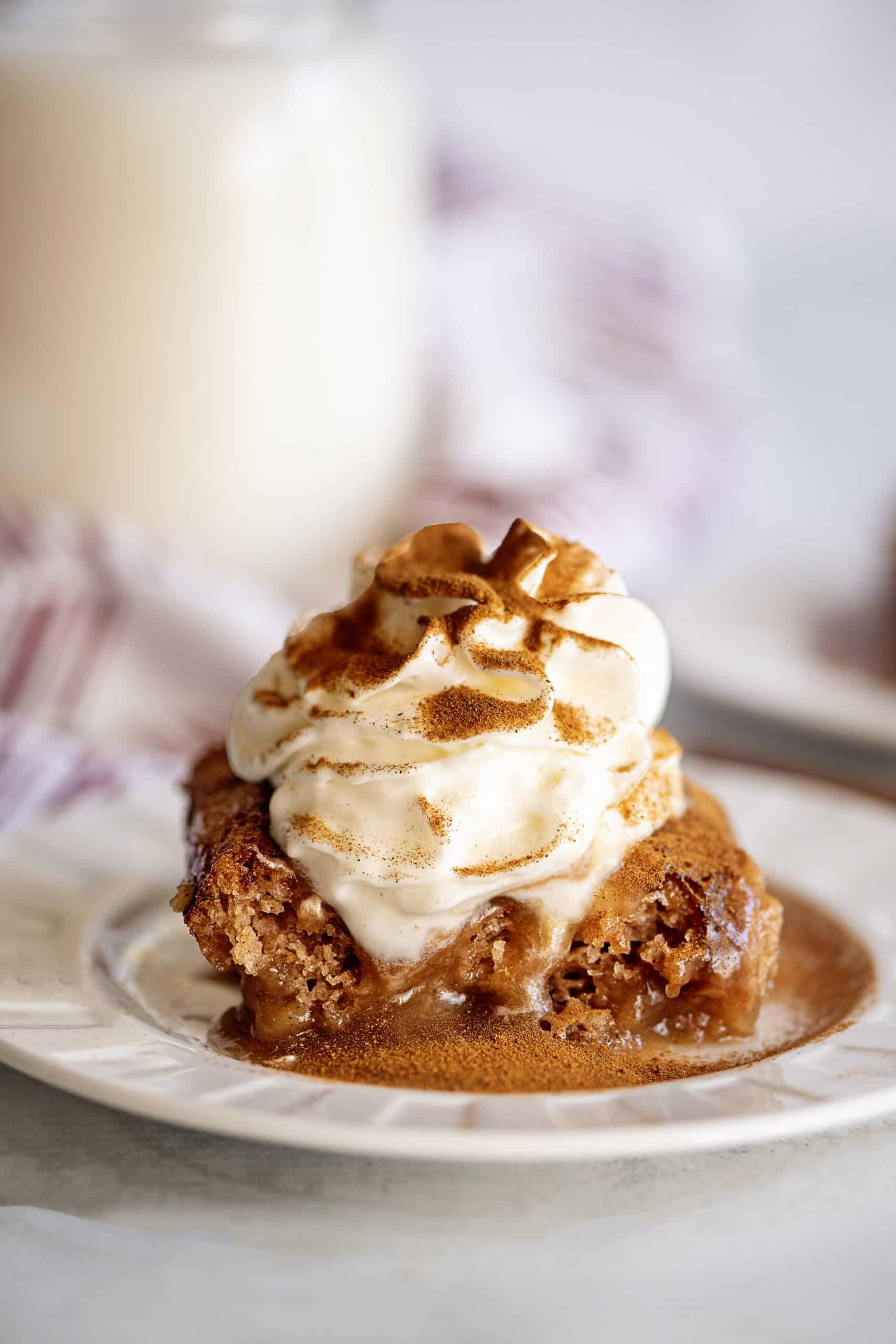 cinnamon cobbler topped with whipped cream