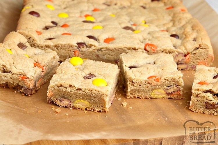 Reese's Peanut Butter Blondies are thick, soft, chewy and full of peanut butter, Reese's Pieces and Reese's Peanut Butter Cups.