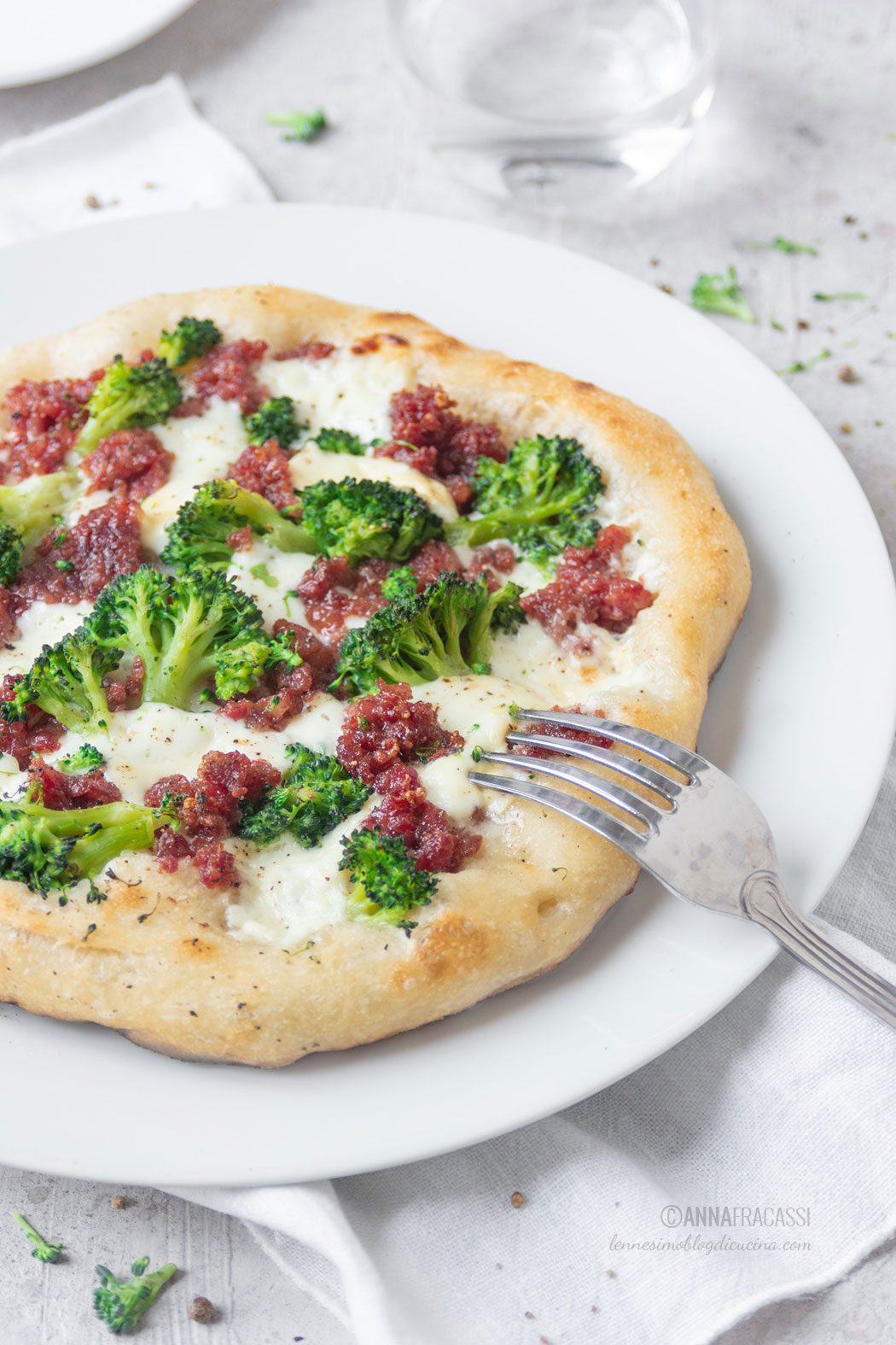 Pizza with cotechino, broccoli and stracchino