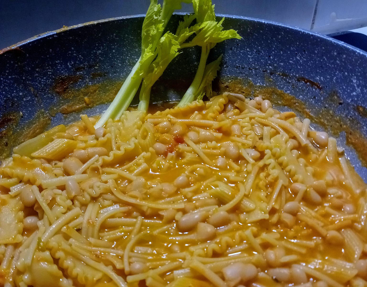pasta and beans in a pan