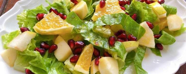 Autumn salad with fruit and pomegranate