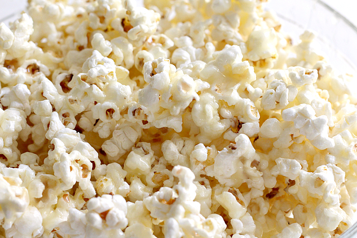 Better Than Caramel Popcorn is gooey, deliciously sweet and so easy to make! The coating in this caramel popcorn is made with butter, sugar and whipping cream - that