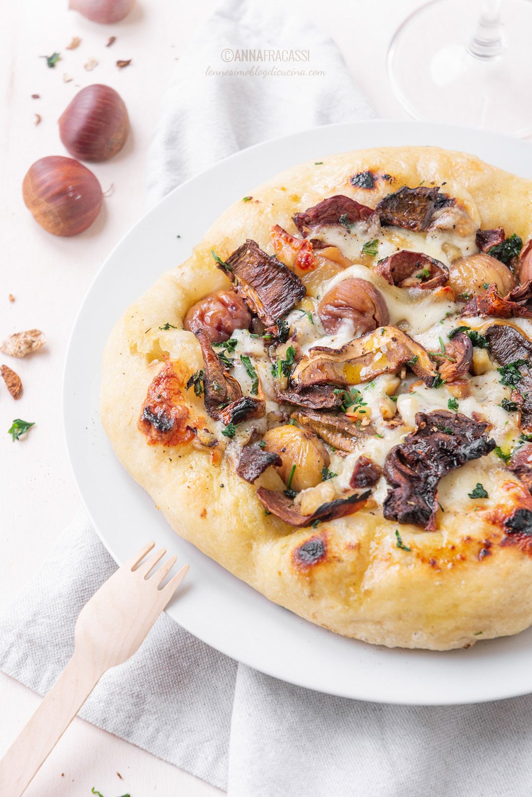 Pizza with porcini mushrooms, chestnuts and scamorza