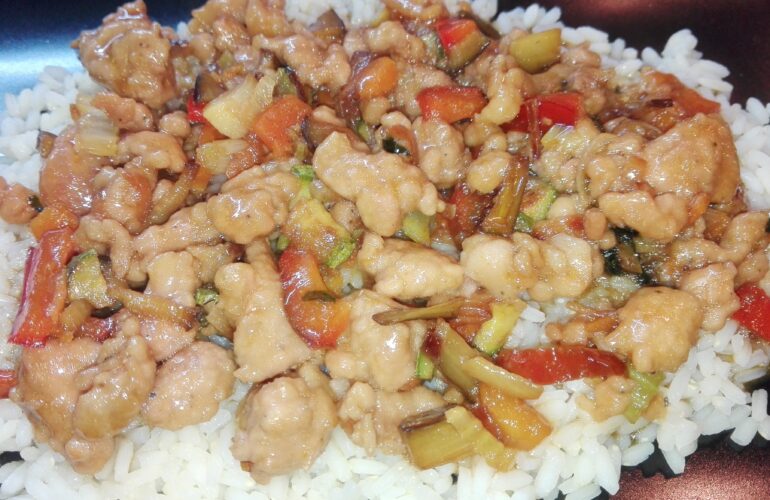 pork with sweet and sour vegetables on pilaff rice