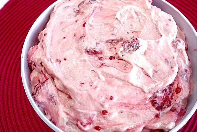 Raspberry Vanilla Jello Salad is one of the easiest recipes you will ever make and it's perfect as a side dish or even dessert! 