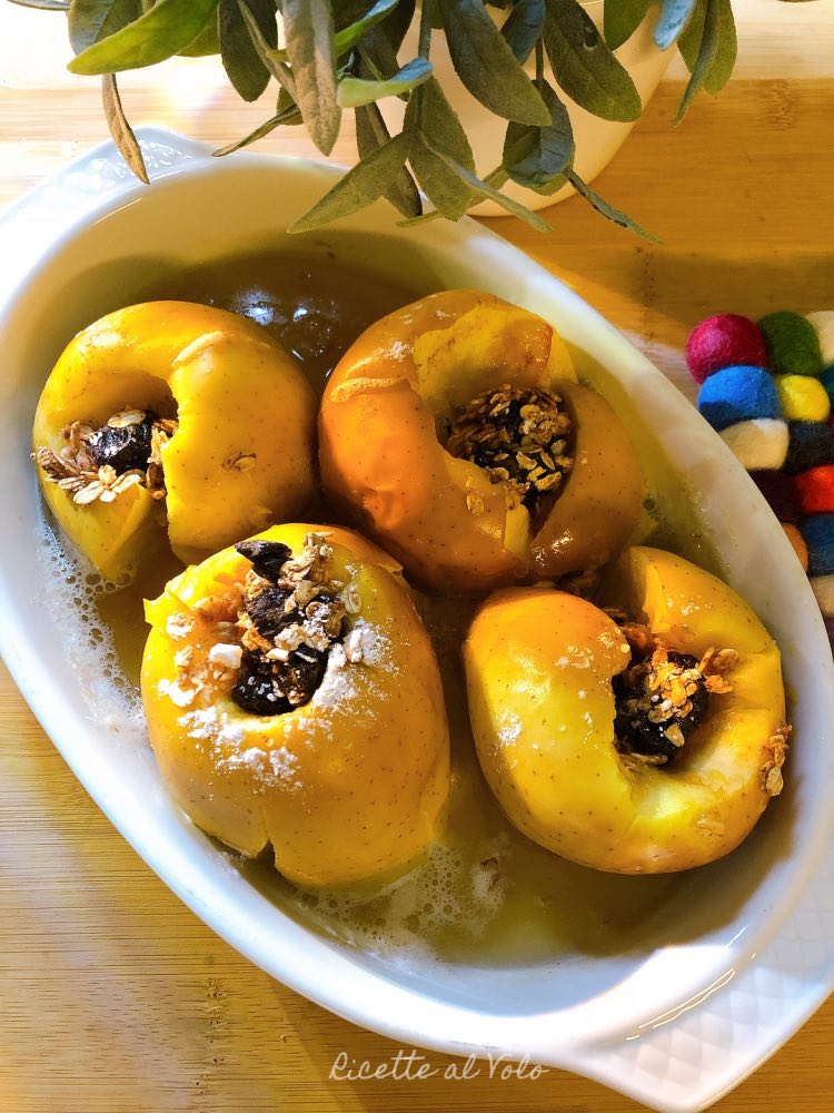 Baked apples with jam and dried fruit